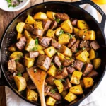 Steak and potatoes recipe with crispy roasted potatoes and a perfectly seared ribeye steak